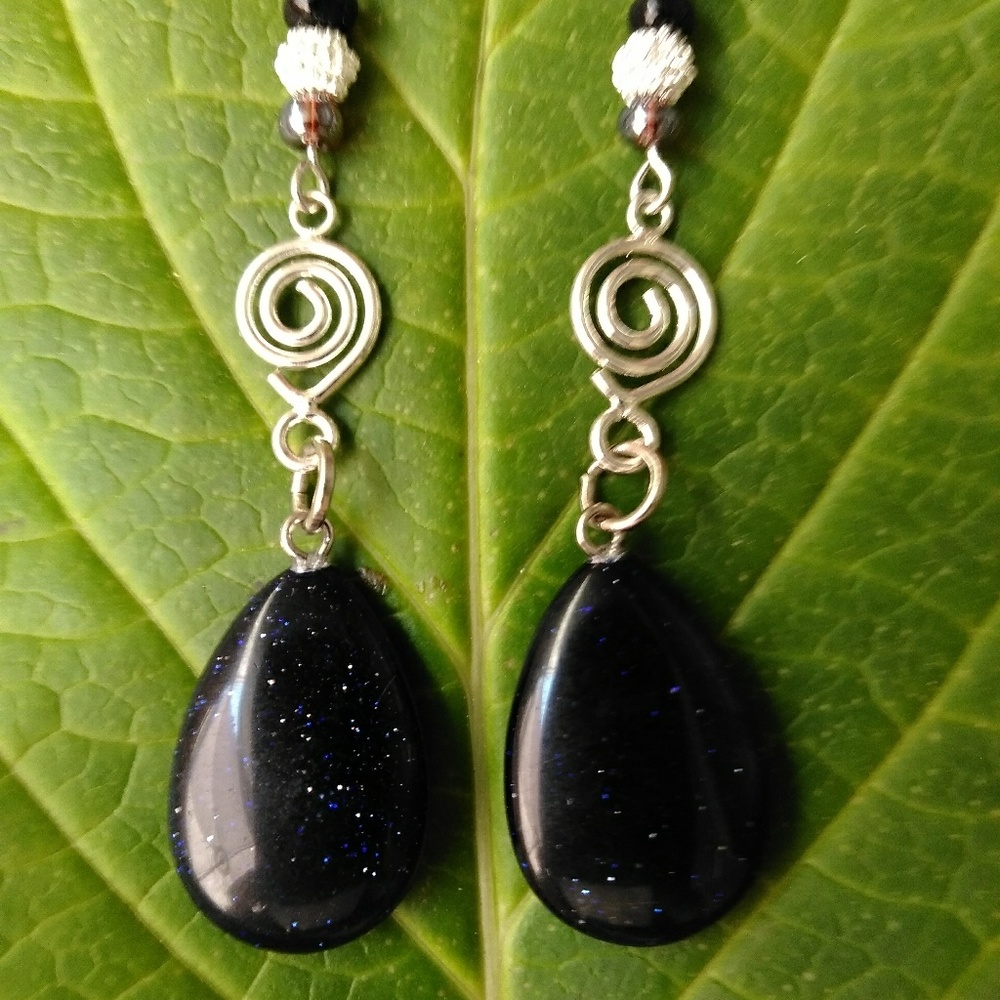 Silver metal with black ceramic teardrop beads